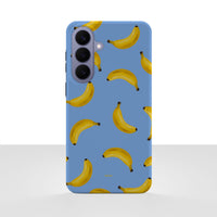 Samsung Galaxy S26 Plus-deksel Bananorama med gule bananer på lyseblå bakgrunn, vist bakfra