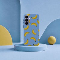 Samsung Galaxy S26 Plus-deksel Bananorama med gule bananer på lyseblå bakgrunn i lyst interiør