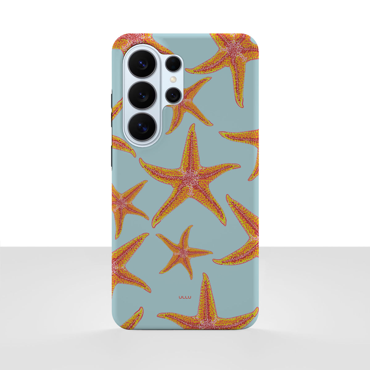 Samsung Galaxy S26 Ultra-deksel Sjøstjerner med oransje sjøstjerner på lyseblå bakgrunn, vist bakfra