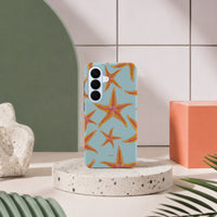 Samsung Galaxy S26-deksel Sjøstjerner med oransje sjøstjerner på lyseblå bakgrunn i lyst interiør