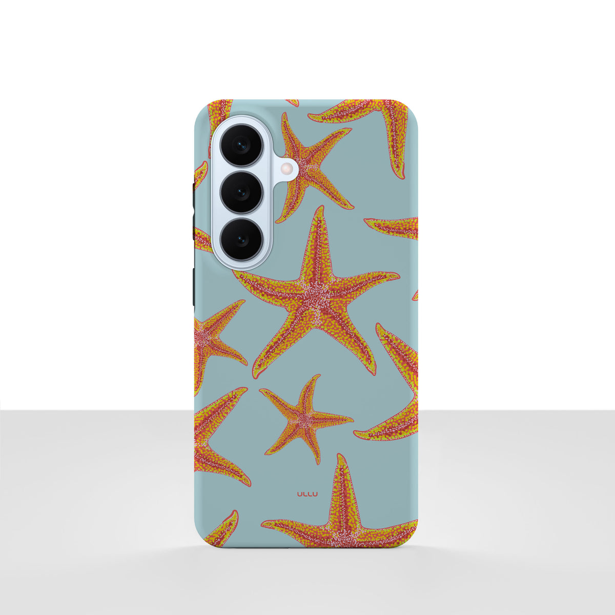 Samsung Galaxy S26-deksel Sjøstjerner med oransje sjøstjerner på lyseblå bakgrunn, vist bakfra
