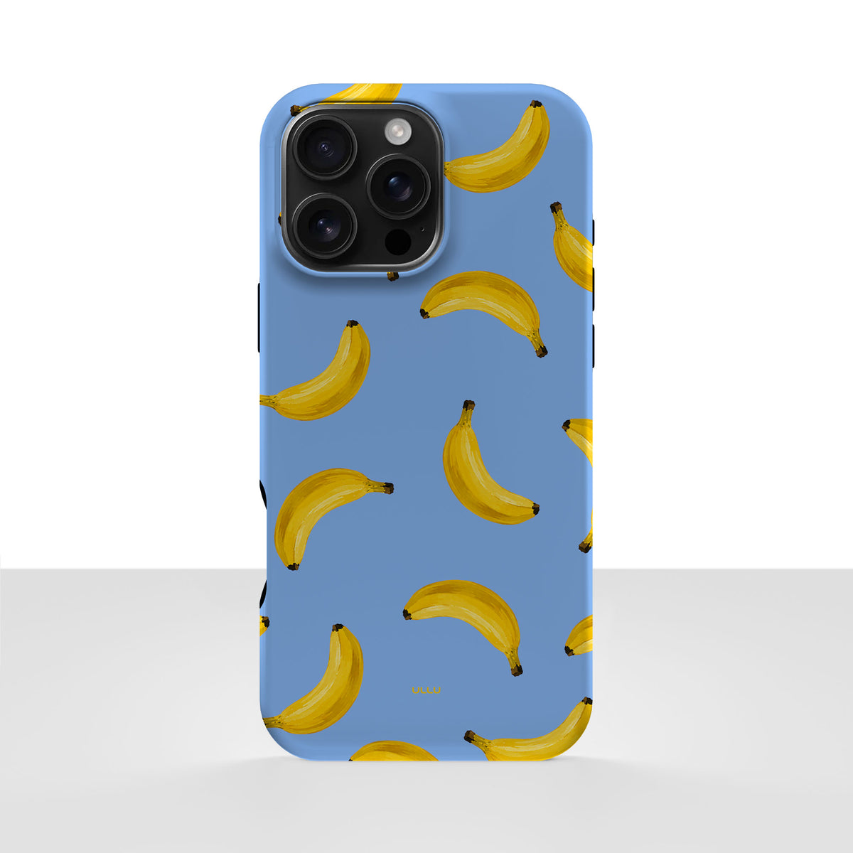 iPhone 16 Pro Max-deksel Bananorama med gule bananer på lyseblå bakgrunn, vist bakfra