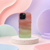 iPhone 16 Pro Max deksel Koralldis med korallrosa, beige og grønn gradient i mykt pastellinteriør