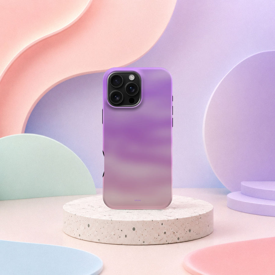 iPhone 16 Pro Max deksel Lilladis med lilla og rosa gradient i mykt pastellinteriør