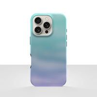 iPhone 16 Pro deksel Himmeldis med blågrønn og lilla gradient på lys bakgrunn