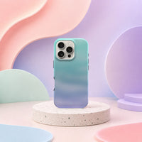 iPhone 16 Pro deksel Himmeldis med blågrønn og lilla gradient i mykt pastellinteriør