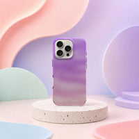 iPhone 16 Pro deksel Lilladis med lilla og rosa gradient i mykt pastellinteriør