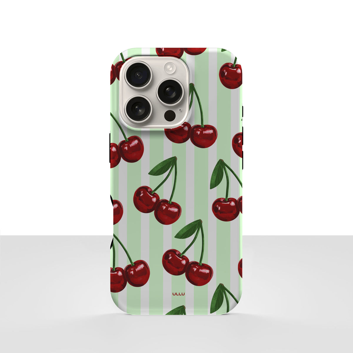 iPhone 16 Pro-deksel Minty Cherry med røde kirsebær og grønne stilker på lysegrønne striper, vist bakfra