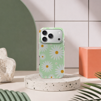 iPhone 17 Pro deksel Kamille med hvite kamilleblomster i moderne pastellinteriør med grønn bue og terrazzo sokkel