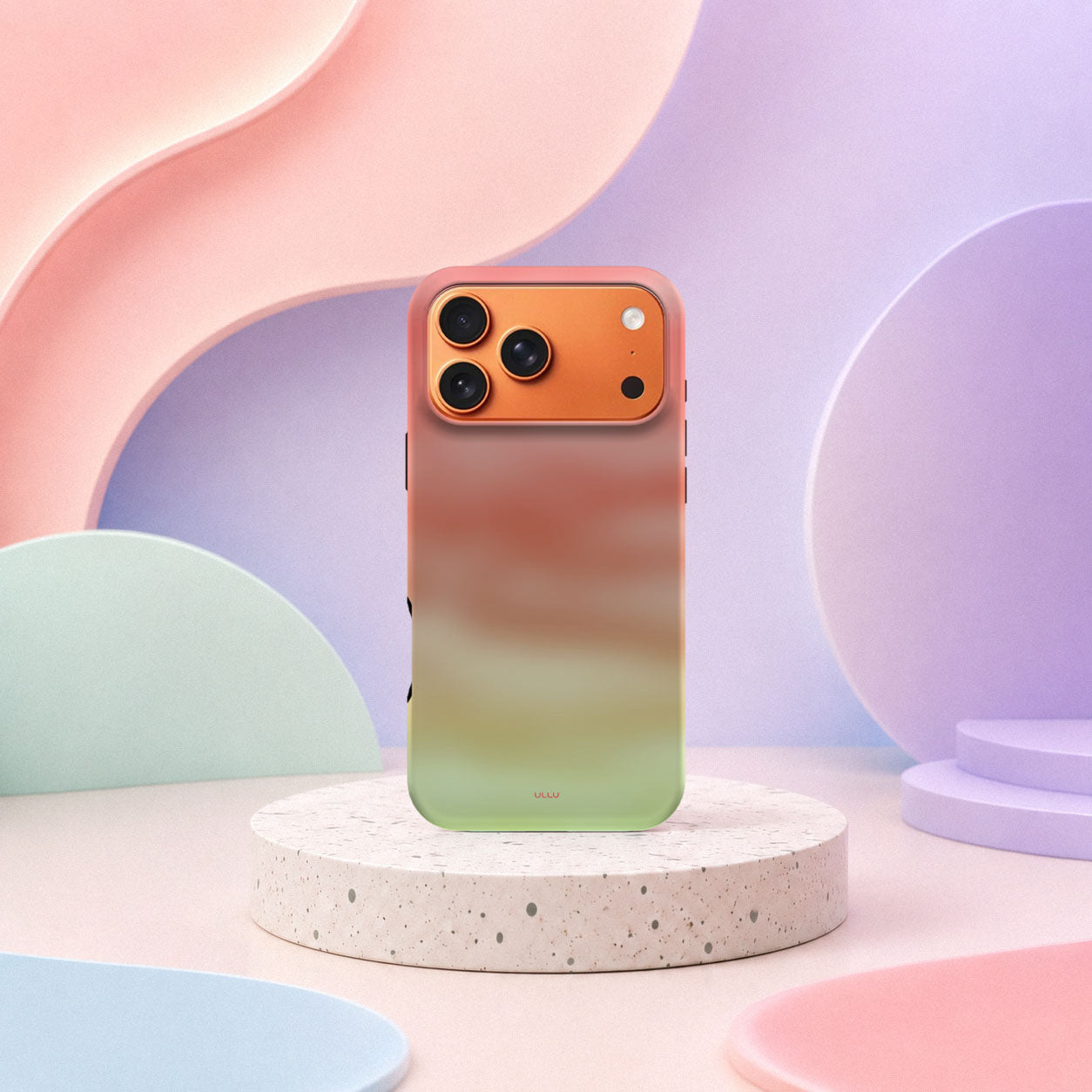 iPhone 17 Pro Max deksel Koralldis med korallrosa, beige og grønn gradient i mykt pastellinteriør
