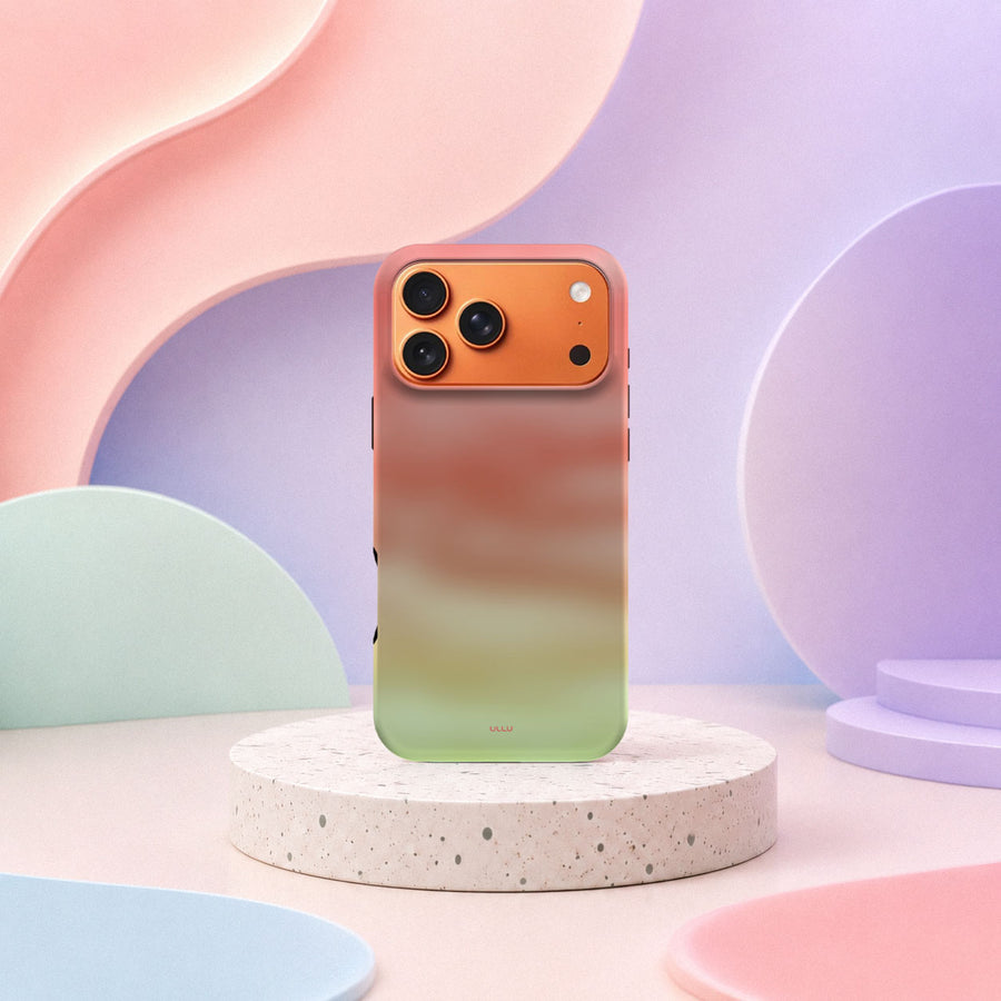 iPhone 17 Pro Max deksel Koralldis med korallrosa, beige og grønn gradient i mykt pastellinteriør