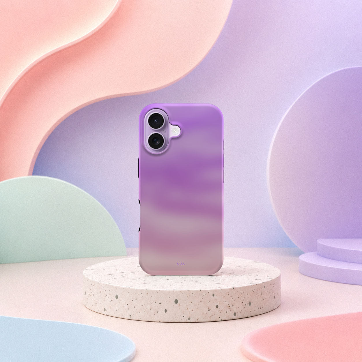 iPhone 17 deksel Lilladis med lilla og rosa gradient i mykt pastellinteriør